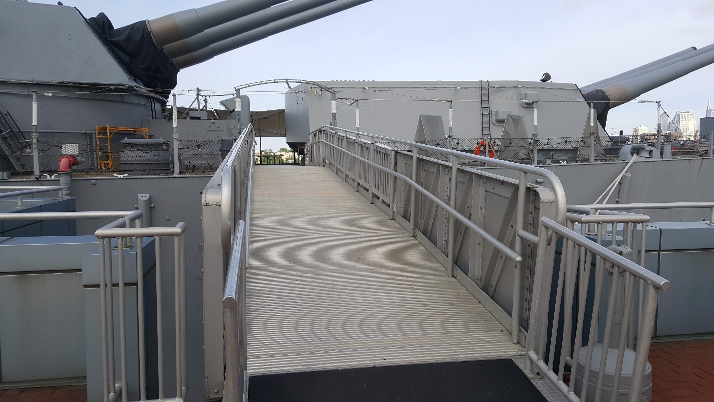 Metal brow or bridge connecting the pier tower to the ship.